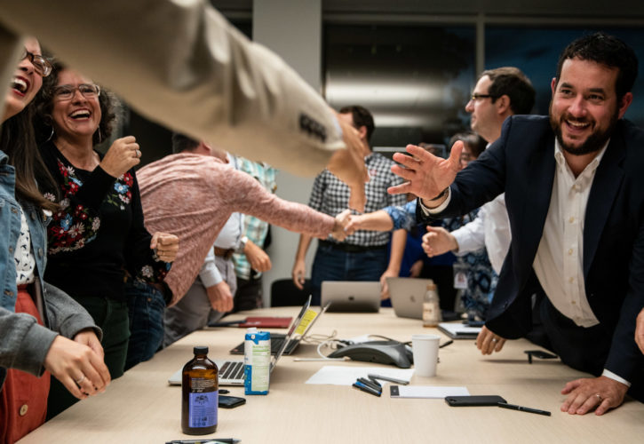 EL SEGUNDO, CALIF. - OCTOBER 16: Members of the LATimes Guild Bargaining Committee and Los Angeles Times management sign a tentatively agreed upon contract at the Los Angeles Times building on Wednesday, Oct. 16, 2019 in El Segundo, Calif. (Kent Nishimura / Los Angeles Times)